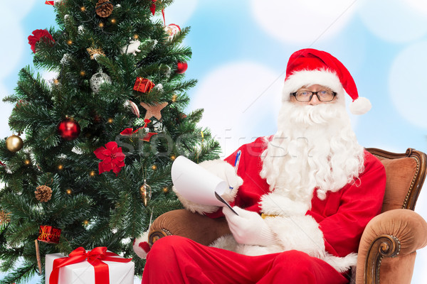 [[stock_photo]]: Homme · costume · notepad · Noël · vacances