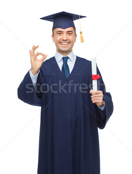 Sonriendo adulto estudiante diploma educación graduación Foto stock © dolgachov