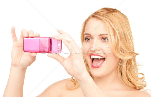 Stock photo: happy woman using phone camera