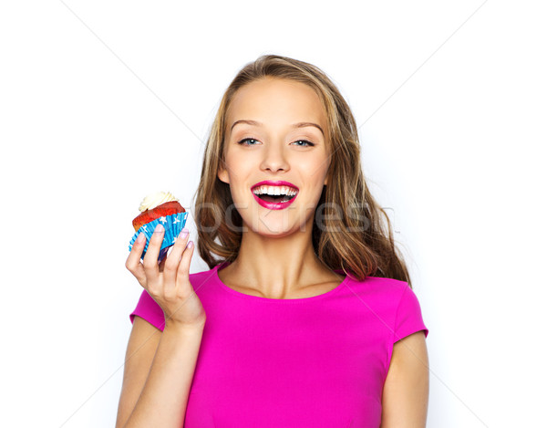 happy woman or teen girl with birthday cupcake Stock photo © dolgachov