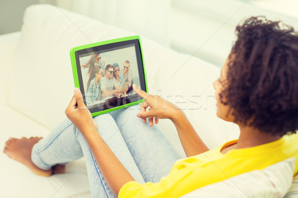 happy african american woman with tablet pc Stock photo © dolgachov