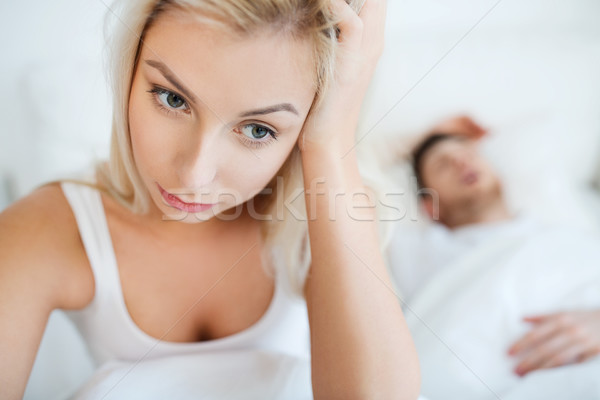 awake woman having insomnia in bed Stock photo © dolgachov