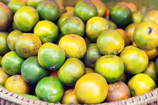 mandarins at asian street market Stock photo © dolgachov