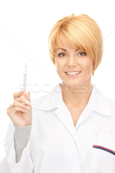 Привлекательная женщина врач термометра фотография женщину счастливым Сток-фото © dolgachov