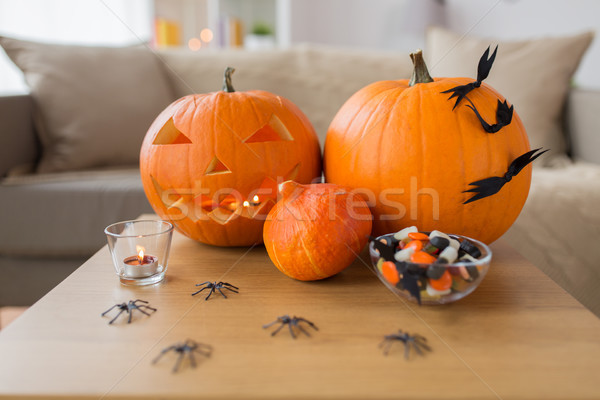 jack-o-lantern and halloween decorations at home Stock photo © dolgachov