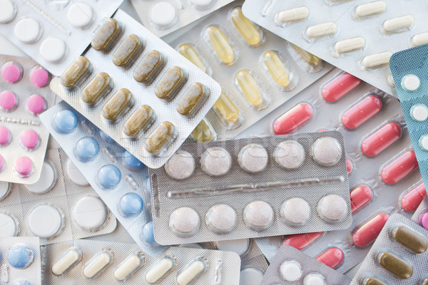 Diferit pastile capsule droguri medicină asistenţă medicală Imagine de stoc © dolgachov