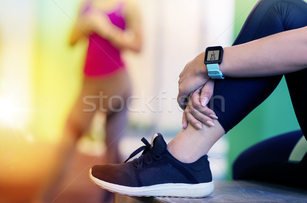 close up of woman with heart rate tracker in gym Stock photo © dolgachov