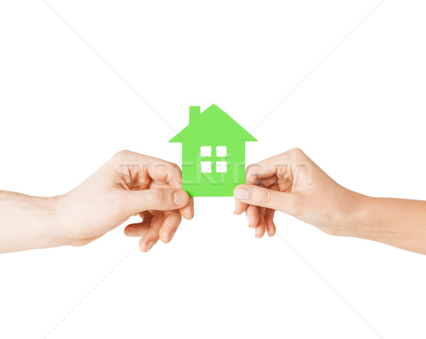 couple hands holding green house Stock photo © dolgachov