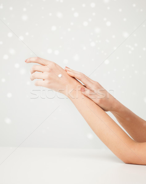 female soft skin hands Stock photo © dolgachov