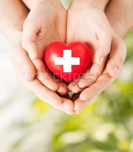 male and female hands with red heart Stock photo © dolgachov