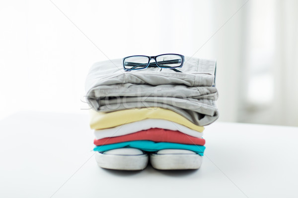 close up of clothes and accessories on table Stock photo © dolgachov