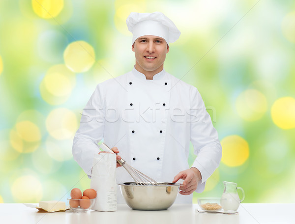 happy male chef cook baking Stock photo © dolgachov