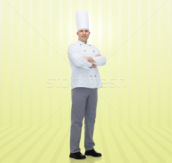 happy male chef cook with crossed hands Stock photo © dolgachov