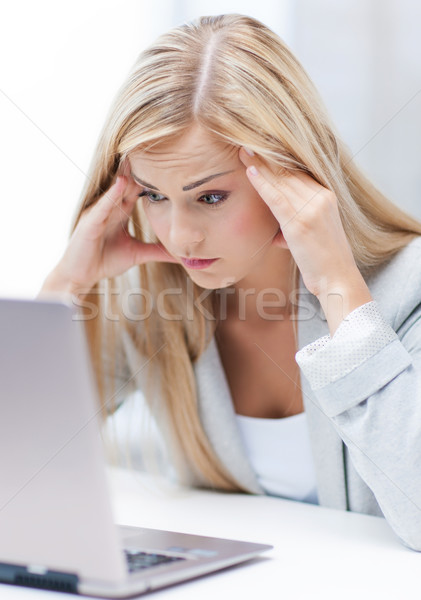 stressed woman with laptop Stock photo © dolgachov