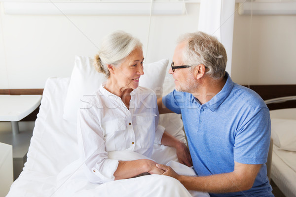 senior couple meeting at hospital ward Stock photo © dolgachov