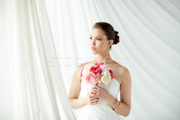 beautiful asian woman with flower and jewelry Stock photo © dolgachov