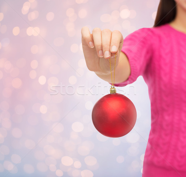 close up of woman in sweater with christmas ball Stock photo © dolgachov