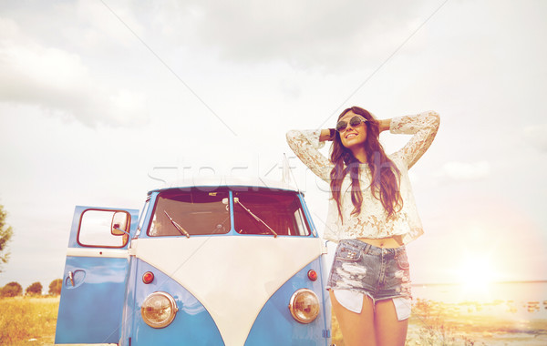 smiling young hippie woman in minivan car Stock photo © dolgachov