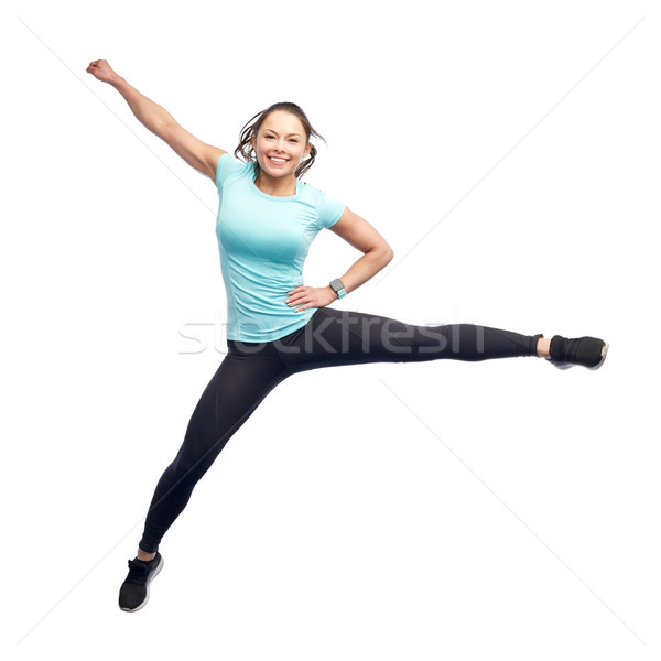 Zdjęcia stock: Szczęśliwy · uśmiechnięty · młoda · kobieta · skoki · powietrza