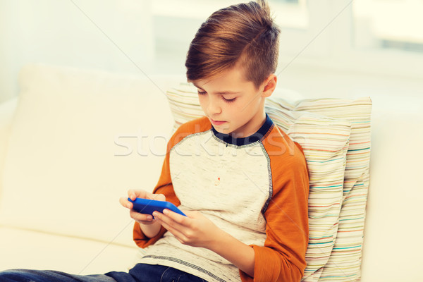 Stock foto: Junge · Smartphone · spielen · home · Freizeit