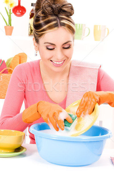 housewife washing dish Stock photo © dolgachov