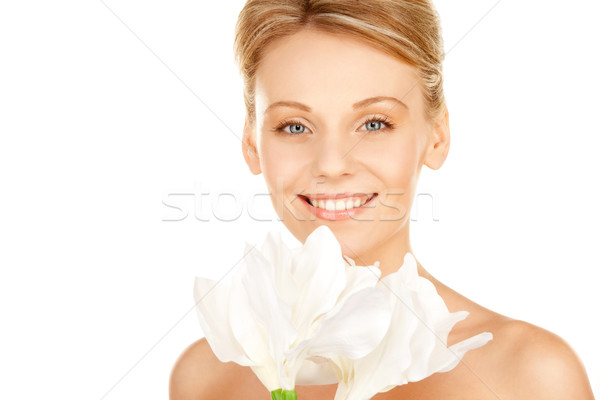 beautiful woman with madonna lily Stock photo © dolgachov