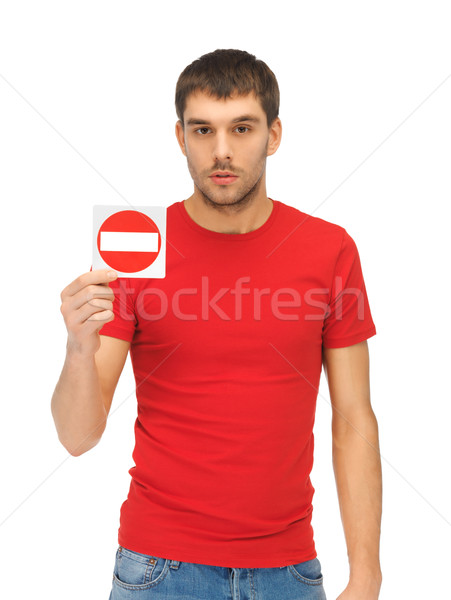 man holding no entry sign Stock photo © dolgachov