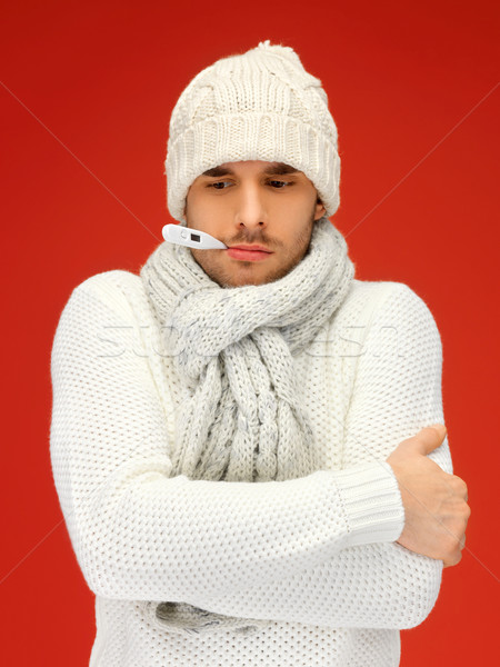 sick man with thermometer in his mouth Stock photo © dolgachov