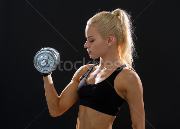 Jonge vrouw zwaar staal Stockfoto © dolgachov