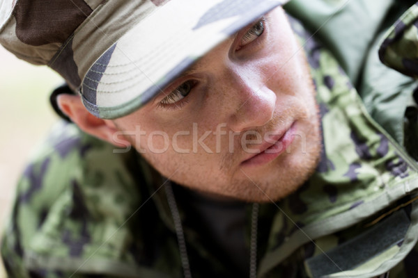 close up of young soldier in military uniform Stock photo © dolgachov