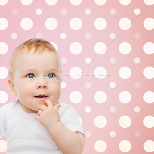 Mosolyog kislány arc rózsaszín pöttyös gyermekkor Stock fotó © dolgachov