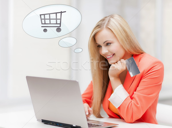 smiling woman with laptop computer and credit card Stock photo © dolgachov