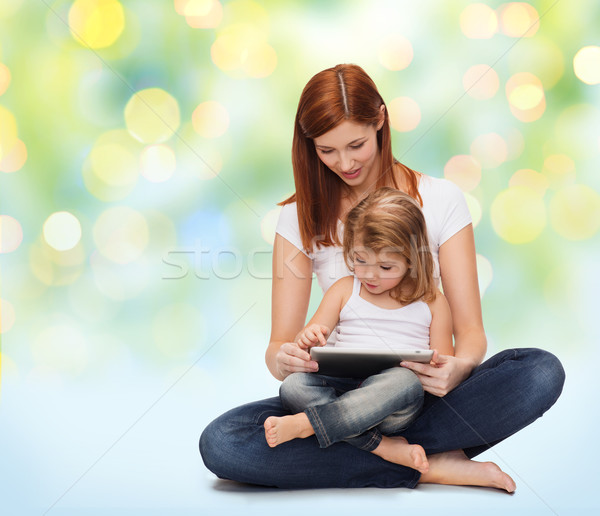 Boldog anya kislány táblagép gyermekkor gyereknevelés Stock fotó © dolgachov