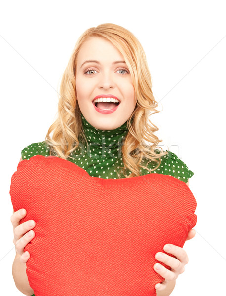 woman with red heart-shaped pillow Stock photo © dolgachov