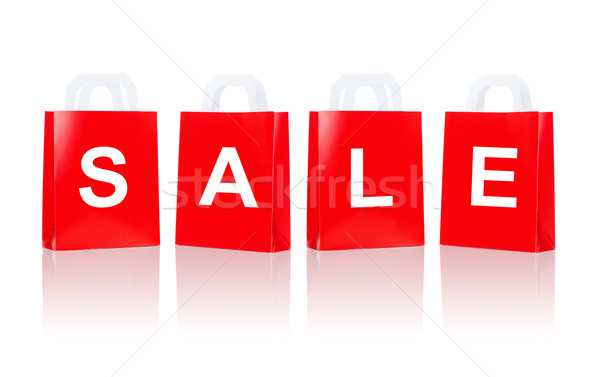 many red shopping bags with sale word Stock photo © dolgachov