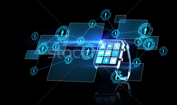 close up of smartwatch with app icons and contacts Stock photo © dolgachov