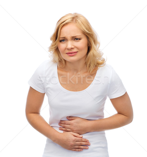Nieszczęśliwy kobieta cierpienie ból brzucha ludzi opieki zdrowotnej Zdjęcia stock © dolgachov