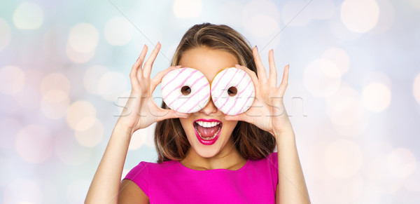 Glücklich Frau teen girl schauen Donuts Menschen Stock foto © dolgachov