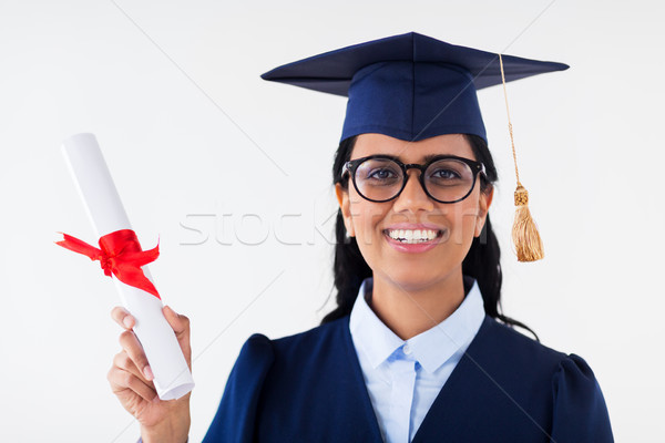 happy bachelor woman in mortarboard with diplomas Stock photo © dolgachov