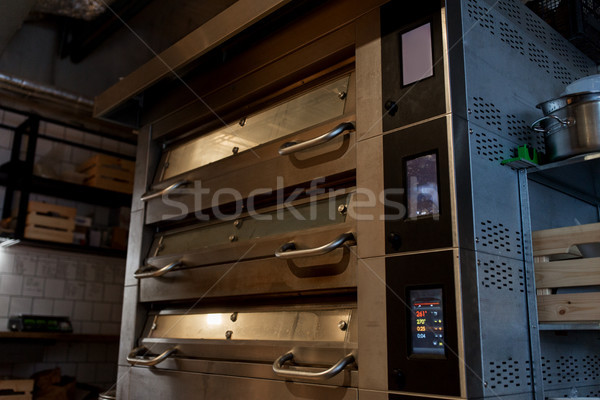 bread oven at bakery kitchen Stock photo © dolgachov