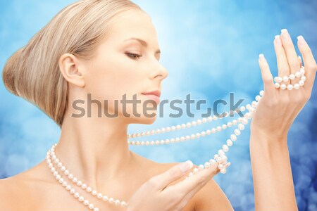 Mujer hermosa perla cuentas Foto mujer cara Foto stock © dolgachov