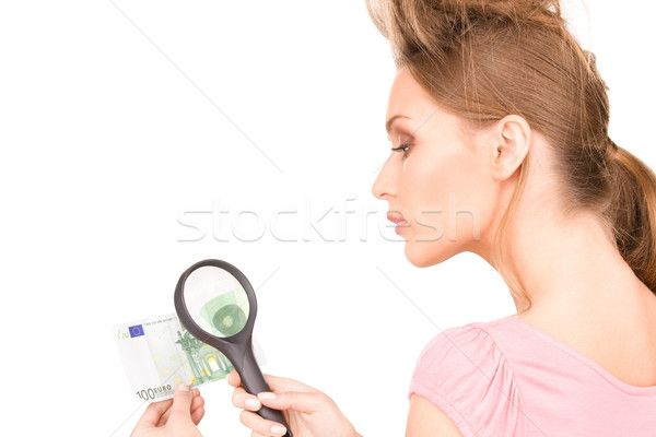 Mulher lupa dinheiro cara euro feminino Foto stock © dolgachov