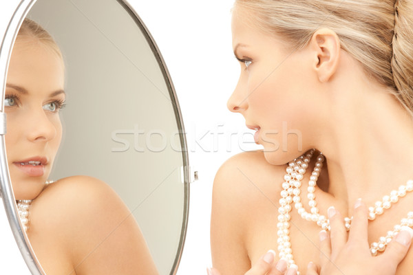 woman with pearl necklace Stock photo © dolgachov