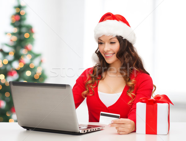 женщину подарок портативного компьютера кредитных карт Рождества рождество Сток-фото © dolgachov