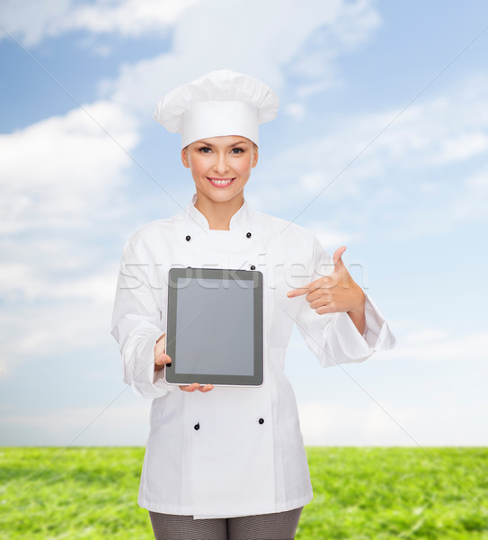 Sorridente feminino chef tela cozinhar Foto stock © dolgachov