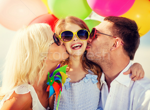 Stock photo: family with colorful balloons