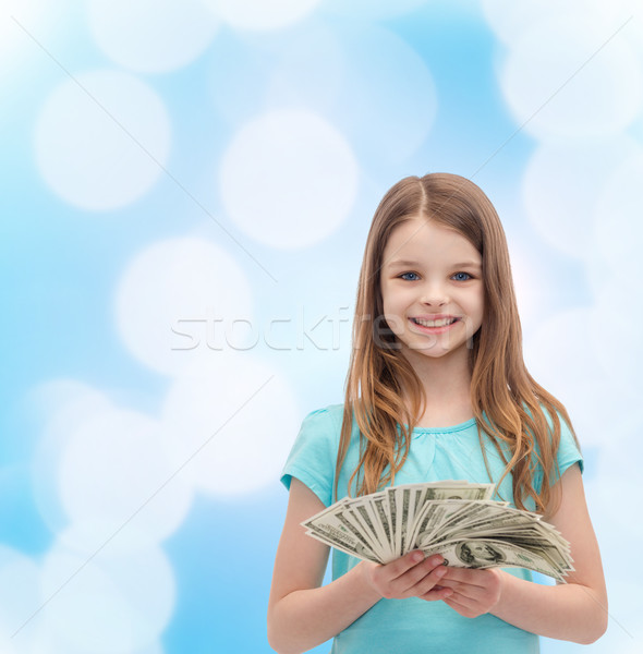 笑みを浮かべて 女の子 ドル 現金 お金 ストックフォト © dolgachov