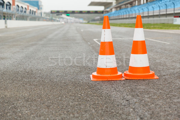 traffic cones on speedway of stadium Stock photo © dolgachov