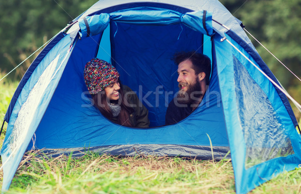 Mosolyog pár turisták néz ki sátor Stock fotó © dolgachov