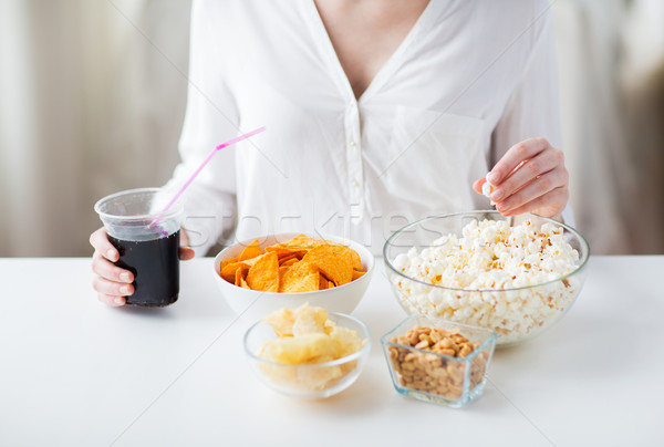 close up of woman with junk food and cola cup Stock photo © dolgachov